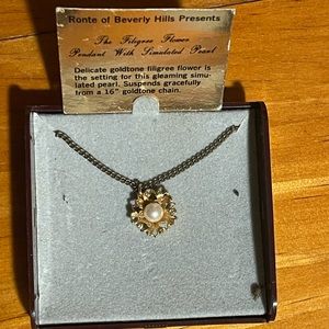 Goldtone filigree flower flower with simulated pearl